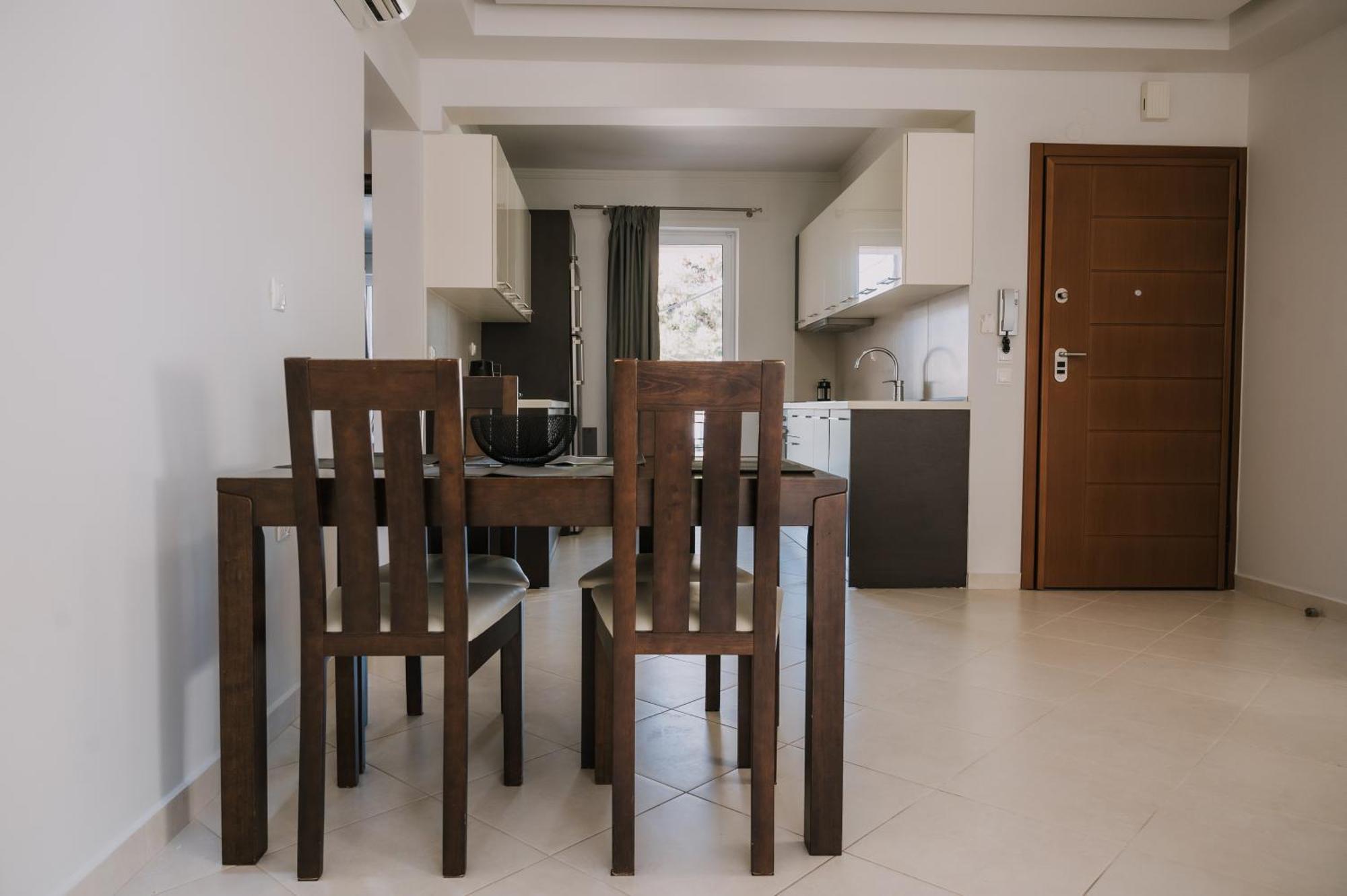 Hb Modern Apartments Tolo Bagian luar foto